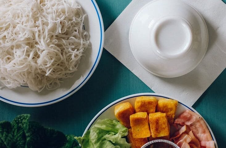 various food placed on blue table