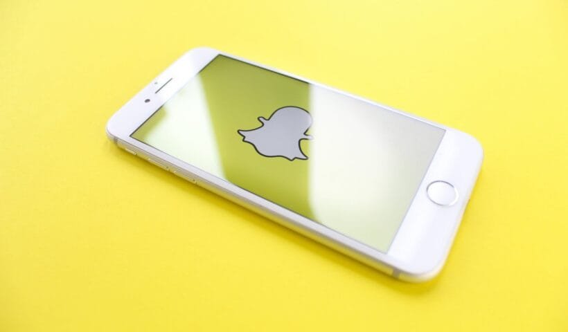 iphone on yellow surface