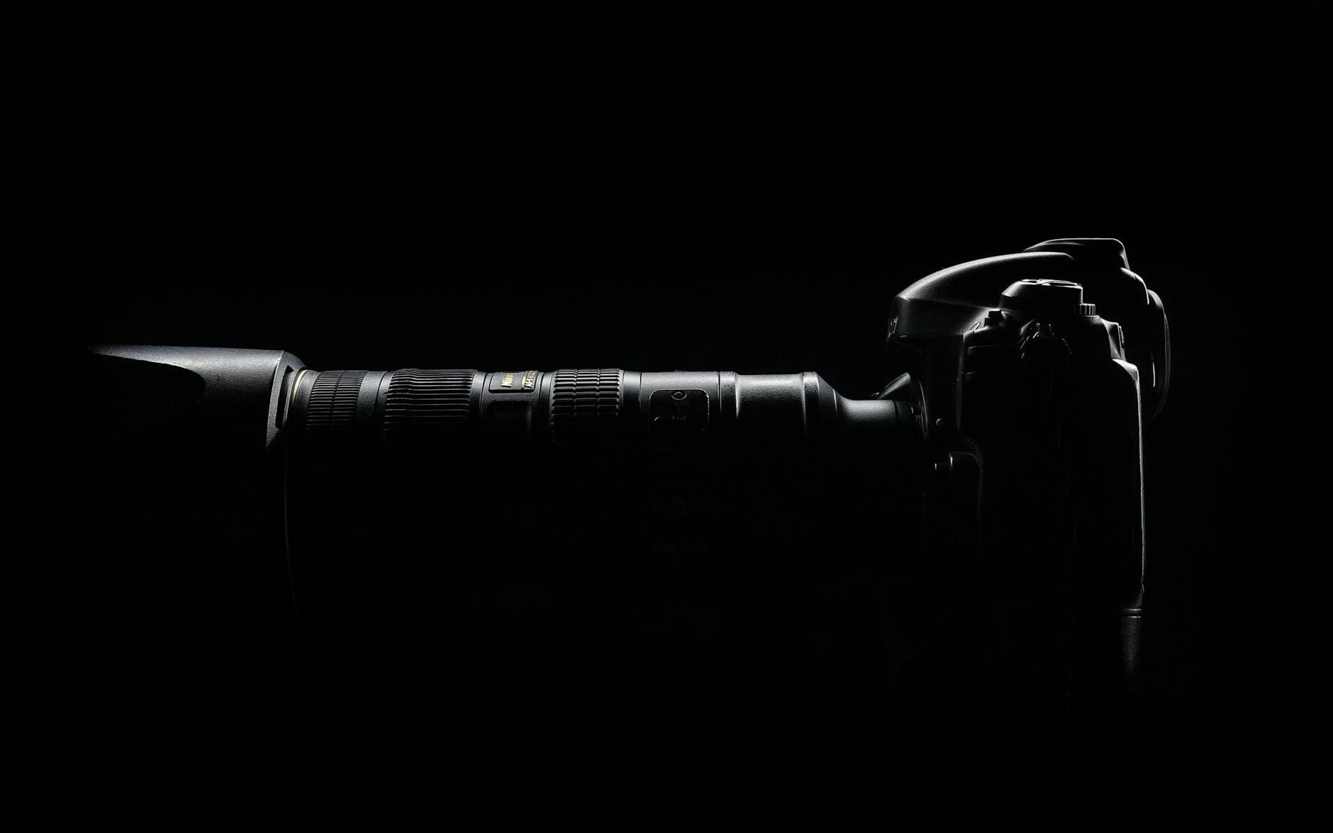 side view photo of black dslr camera